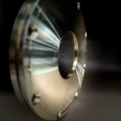 Mirror-finish flange demonstrating surface quality and control.