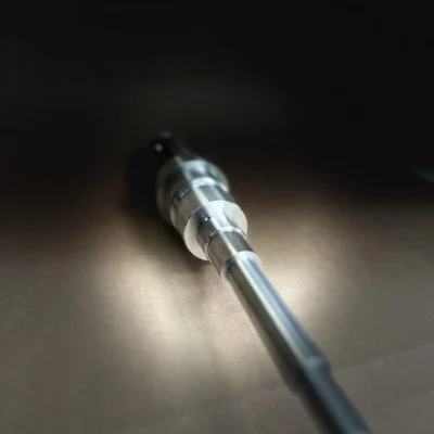 Custom-engineered shaft with ground and polished features.
