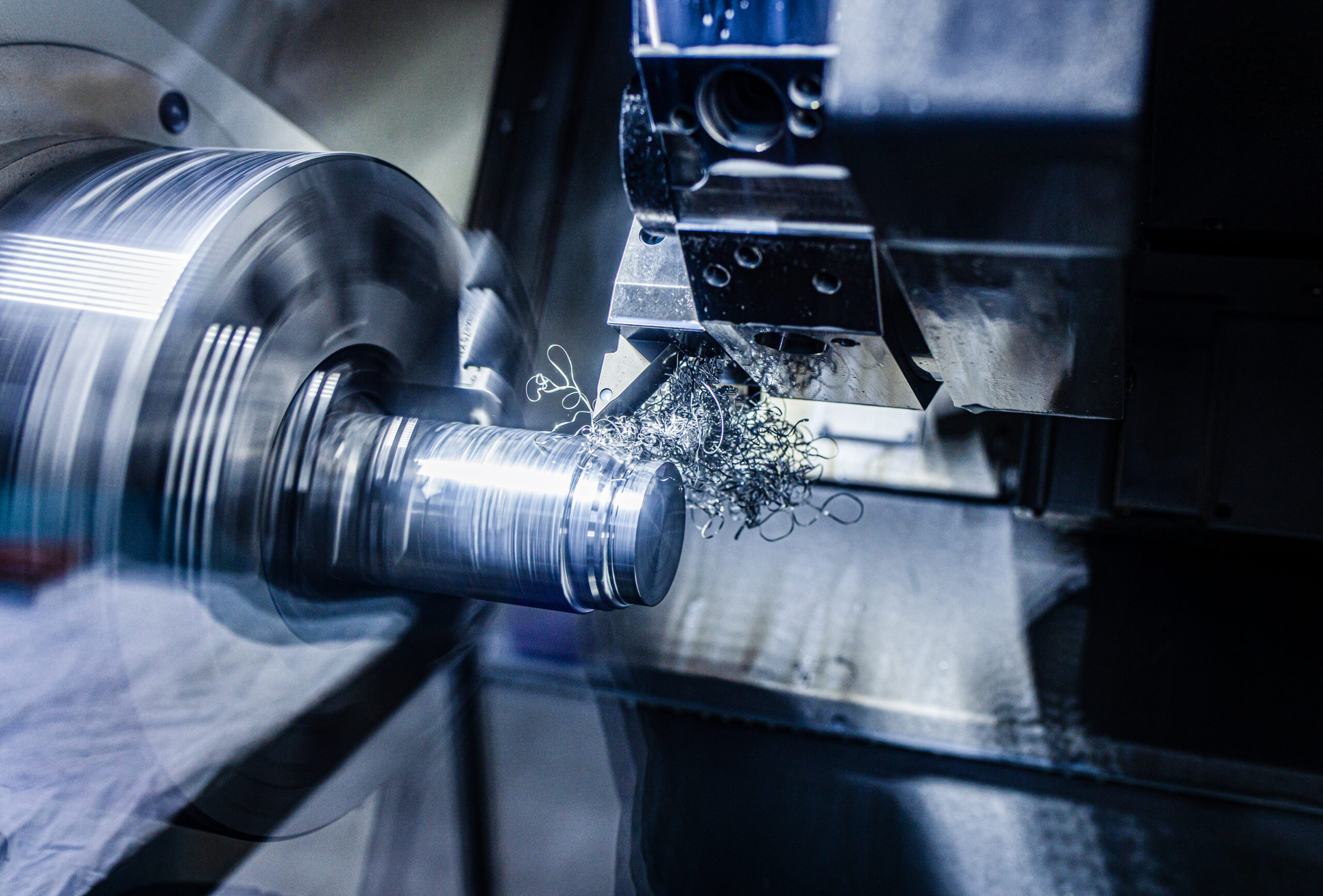 Close up of CNC machine cutting metal.